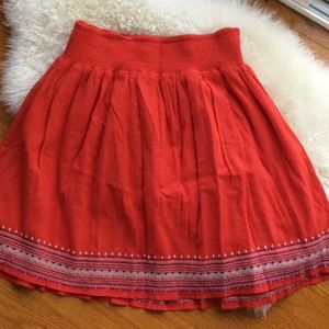 Red Colton skirt with embroidery detail